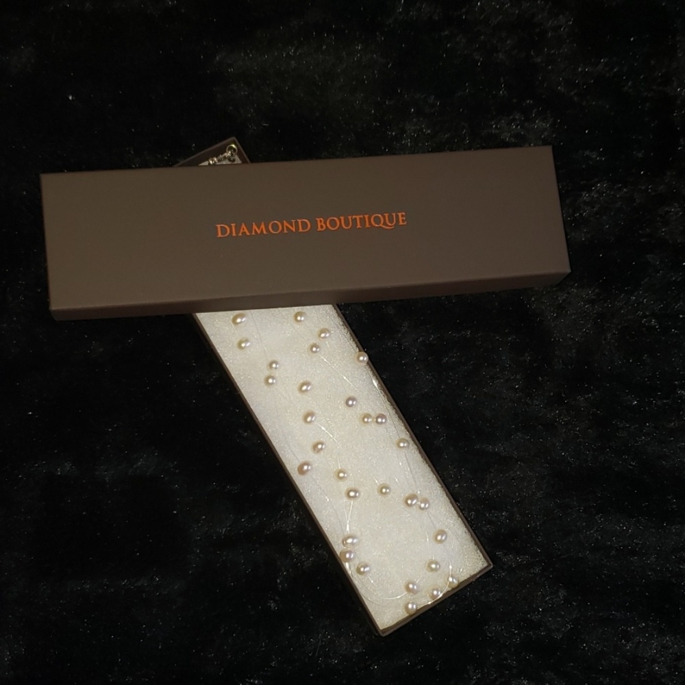 Diamond Boutique floating pearl necklace